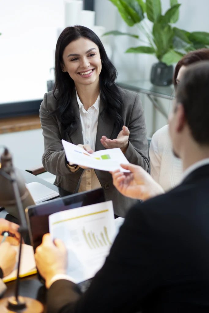 Recruitment consultant discussing hiring process with client during a staffing consultation